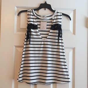 White and black striped tank